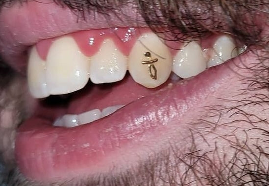 Dagger Outline Tooth Charm